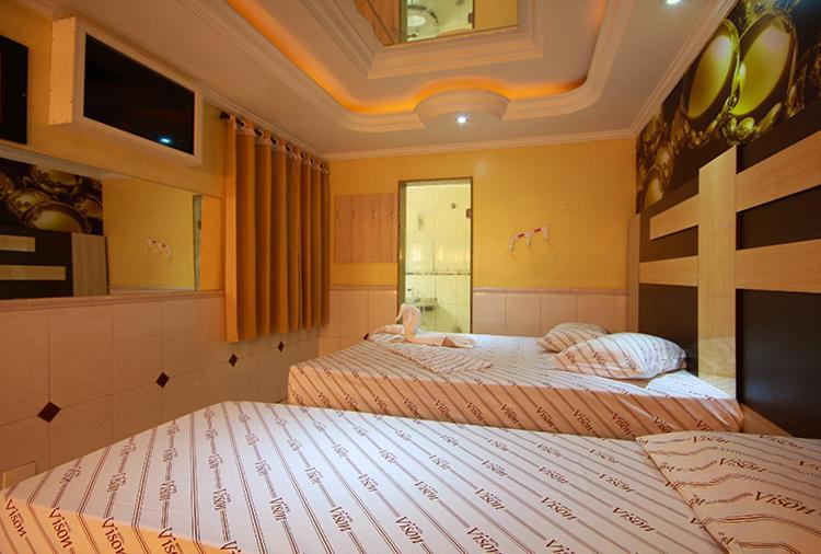 Motel Vison กัวรูยุส ภายนอก รูปภาพ