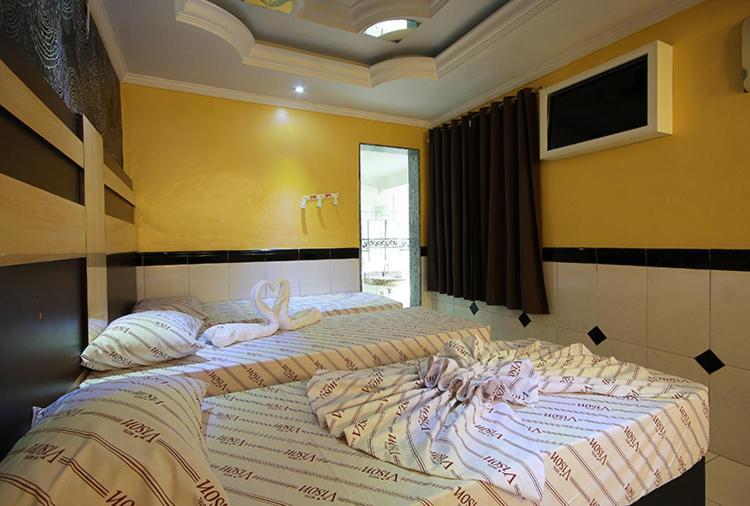 Motel Vison กัวรูยุส ภายนอก รูปภาพ